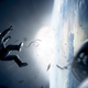 Illustration for article titled Chilling poster for Alfonso Cuaróns emGravity/em sets up a space nightmare